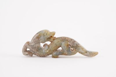 figurine of a cat and a dog on a white background
