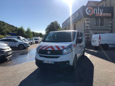 a white van that is parked in a parking lot