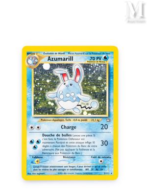 a close up of a pokemon card on a white surface