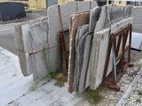 a pile of granite on the side of the road