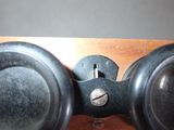 a close up of a pair of binoculars on a table