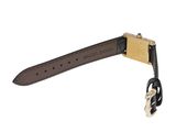 a close up of a watch strap with a key on it