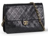 a chanel black quilted leather shoulder bag with gold hardware