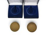 pair of blue velvet cufflinks with gold plated buttons