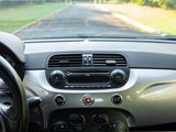 a dashboard of a car with a view of the road
