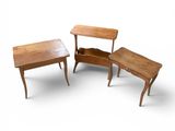 three pieces of furniture sitting on top of each other on a white surface