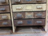 many drawers that are stacked on top of each other
