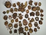 a lot of different metal items on a white surface