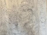 pencil drawing of a man sitting at a table with a dog