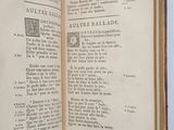 an open book with a picture of a man on it