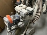 a machine that is sitting on the floor in a room