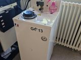 an image of a room with a stove and a radiator