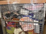 a cart with many items in it in a warehouse