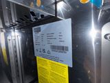 an image of a refrigerator with a price tag on it