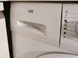 a washer and a dryer sitting next to each other