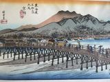 a picture of a painting of a bridge over a body of water