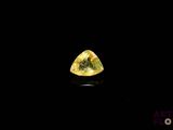 a yellow diamond on a black background