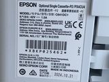 a label on the back of a printer that says epson