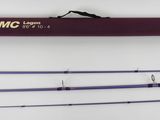 a purple and black fishing rod and a purple bag