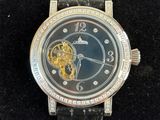 a watch that is sitting in a box on a table