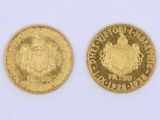 deux pièces d'or portant un blason