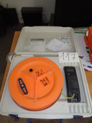 a plastic tray with an orange object on top of it