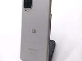 a close up of a cell phone on a stand