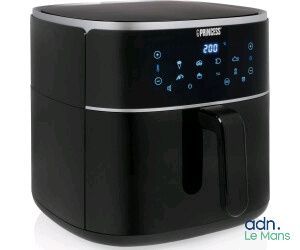 a black air fryer sitting on top of a white counter