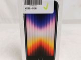 a box with a phone inside of it sitting on a table