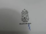 an image of a close up of a plate with a castle on it