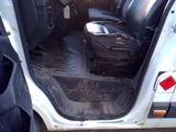 a suitcase in the back seat of a car