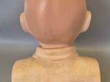 a small vase that has a small number on it
