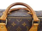 a close up of a brown louis vuitton bag