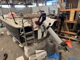 a boat that is being built in a building