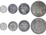 an image of a group of silver coins on a white background