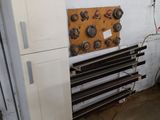 a picture of a room with a bunch of tools on the wall