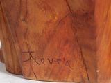 a close up of a wooden block with writing on it