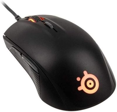 a close up of a mouse on a white surface