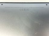 the back of a silver laptop with a small screen on it