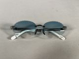 the glasses are made of plastic and have a metal frame
