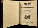 an open book with a picture of a group of people on it