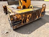 an image of a construction vehicle that is sitting in the dirt