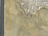 a picture of a painting of a woman on the beach