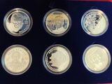 an image of a set of six silver coins