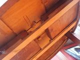 a wooden barrel sitting on top of a wooden table