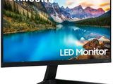 the samsung led monitor is shown with a lake in the background