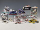 a lot of toy cars that are in a display case