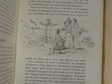 an open book with a drawing of a man and a woman on it