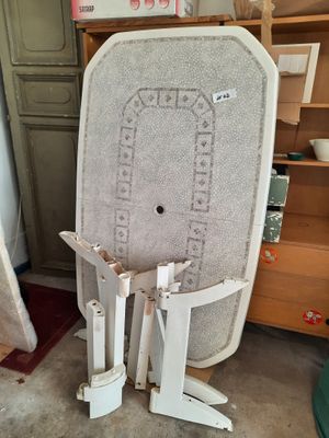 a chair that is sitting in the middle of a room