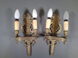 pair of antique wall sconces with brass finish and frosted glass